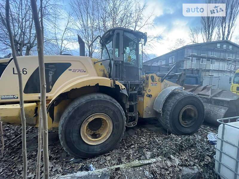 Фронтальный погрузчик New Holland 270 2009 в Одессе