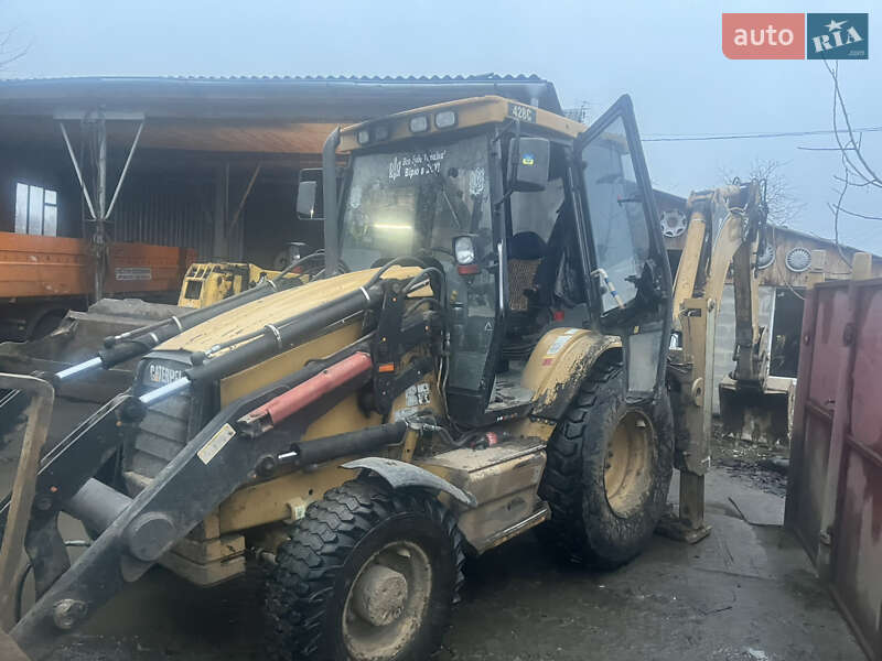 Экскаватор погрузчик Caterpillar 428E 1999 в Малине