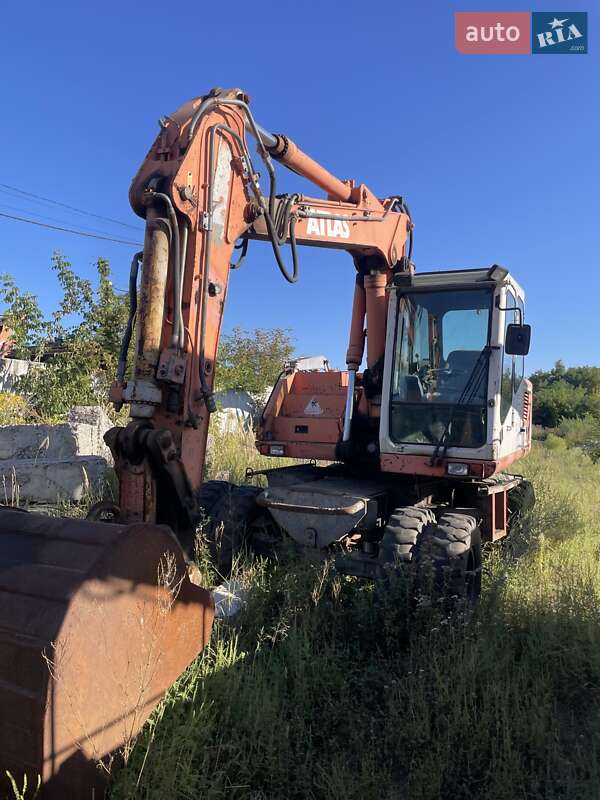 Экскаватор погрузчик Atlas 1304 2000 в 