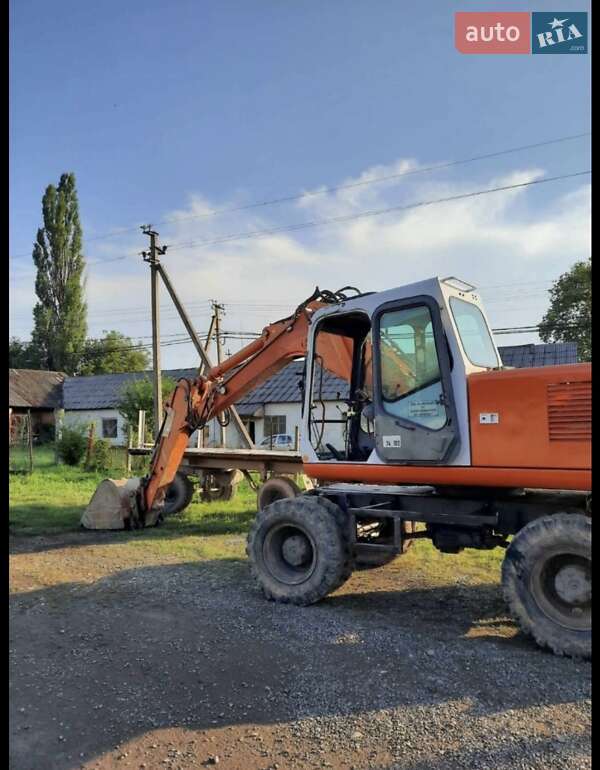 Экскаватор погрузчик Atlas 1404 1996 в Хусте