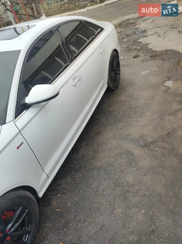 Audi A6 2014 VIN WAUFMAFC5FN029119 фото оголошення 13 з 87