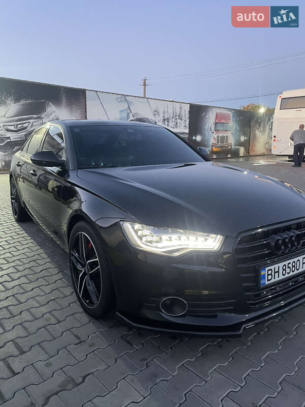 Седан Audi A6 2015 в  фото Седан Audi A6 2015 в