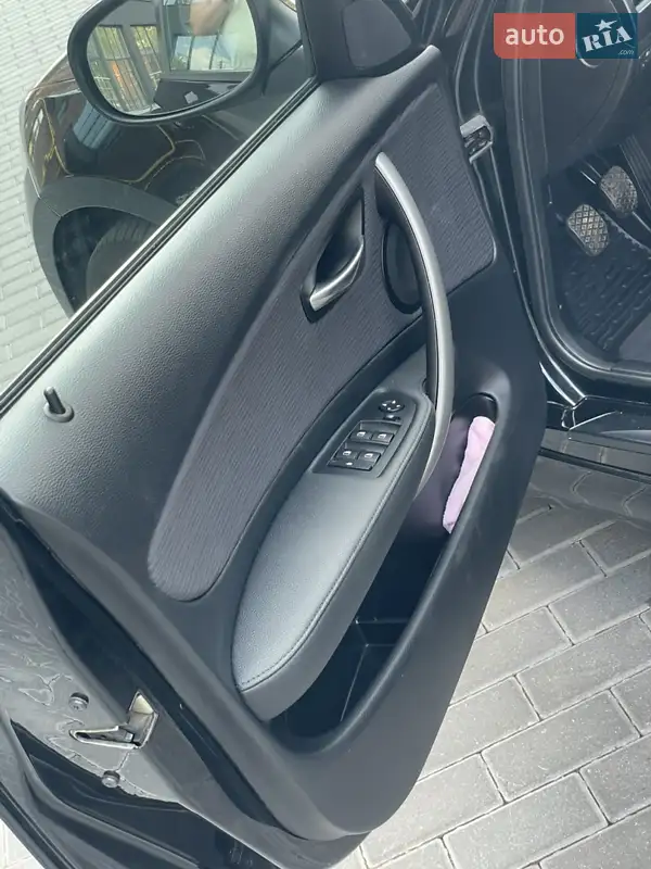 BMW 1 Series 2009 VIN WBAUH31010E402488 фото оголошення 23 з 70