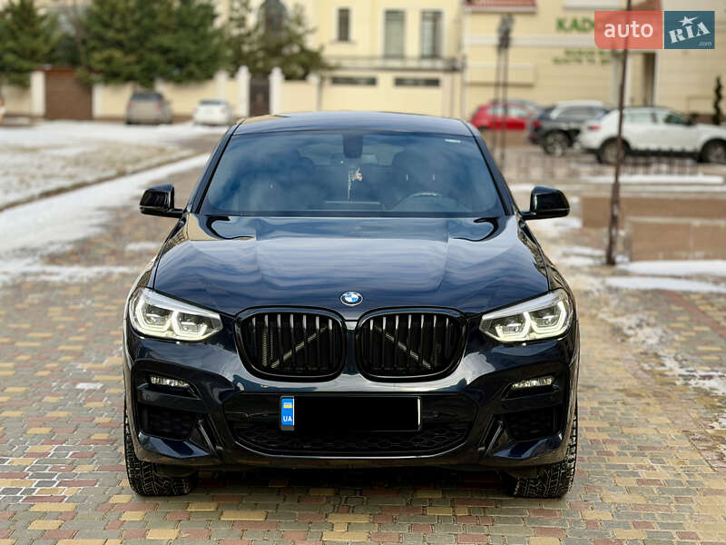 2020 BMW X4, VIN WBAUJ710309E70864:plate — фото 1 (autoria)