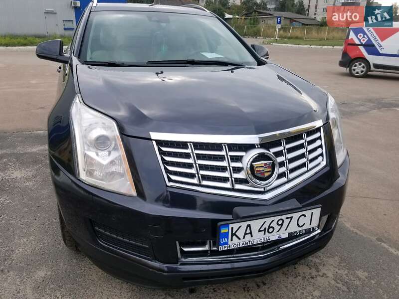 Внедорожник / Кроссовер Cadillac SRX 2014 в 