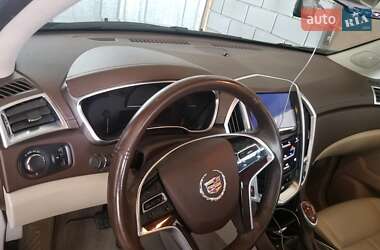 Внедорожник / Кроссовер Cadillac SRX 2014 в 