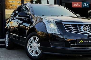 Внедорожник / Кроссовер Cadillac SRX 2014 в 