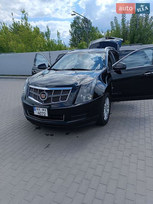 Внедорожник / Кроссовер Cadillac SRX 2011 в 