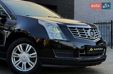 Позашляховик / Кросовер Cadillac SRX 2014 в 