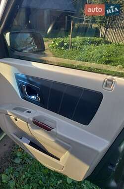 Позашляховик / Кросовер Cadillac SRX 2004 в 