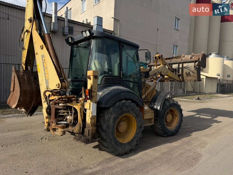 Экскаватор погрузчик Case Construction 695 ST 2002 в Радомышле