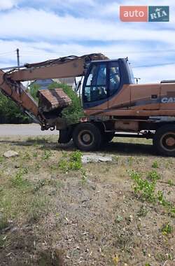 Колісний екскаватор Case Construction WX 210 2009 в 
