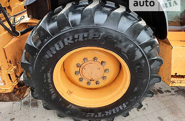 Экскаватор погрузчик Case IH 595 SLE 2001 в 