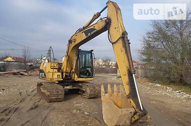 Экскаватор погрузчик Caterpillar 312 2003 в Киеве