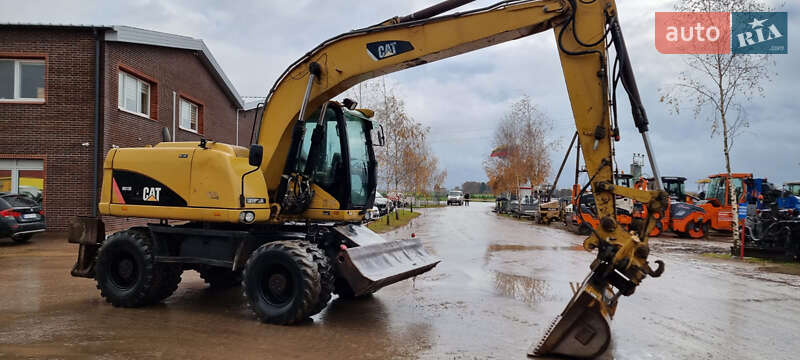Колесный экскаватор Caterpillar 313 2010 в Одессе