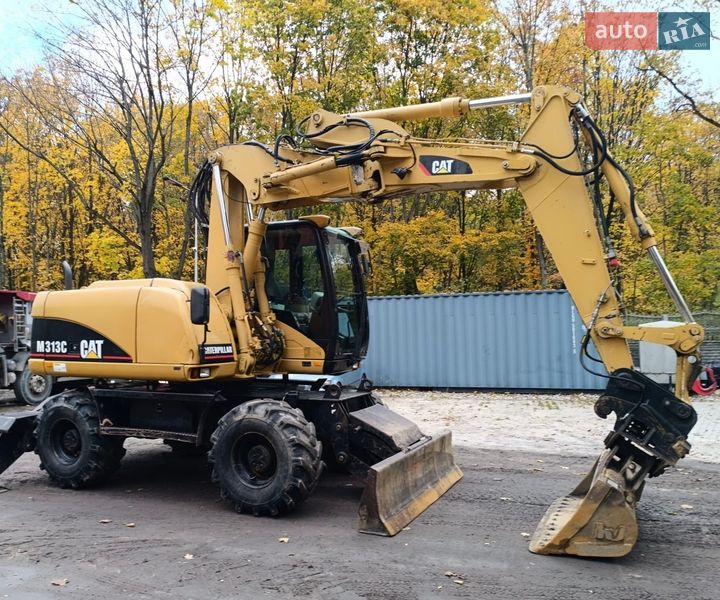 Колесный экскаватор Caterpillar 313 2007 в Львове