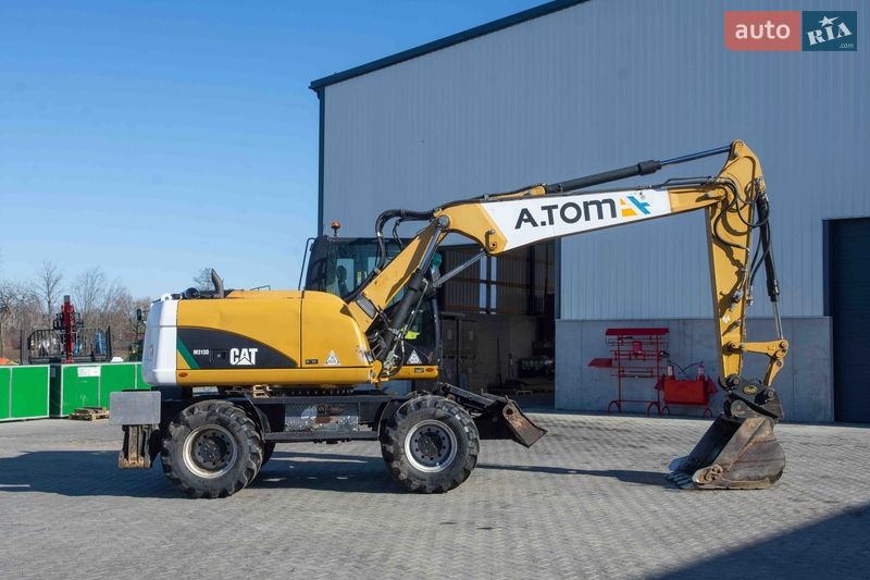 Колісний екскаватор Caterpillar 313 2012 в Житомирі