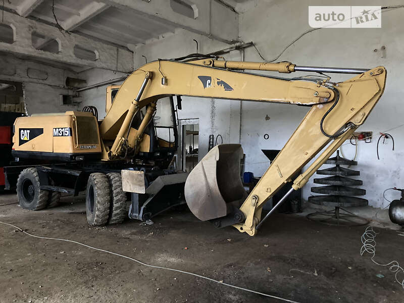 Колісний екскаватор Caterpillar 315 2001 в Косові