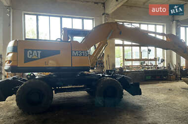 Колесный экскаватор Caterpillar 315 2001 в 