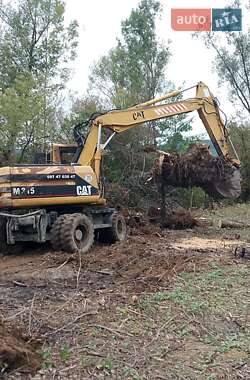 Экскаватор погрузчик Caterpillar 315 1999 в Хусте