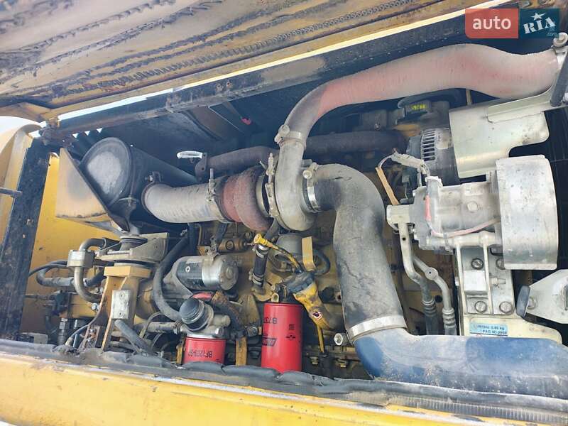 Колесный экскаватор Caterpillar 316 2009 в Николаеве