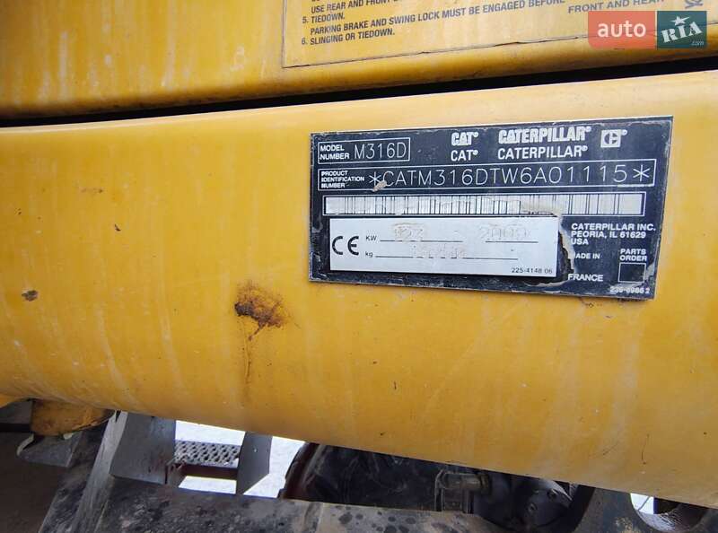 Колесный экскаватор Caterpillar 316 2009 в Николаеве