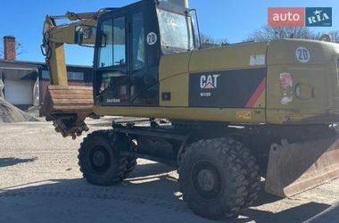 Колесный экскаватор Caterpillar 318 2012 в Виннице