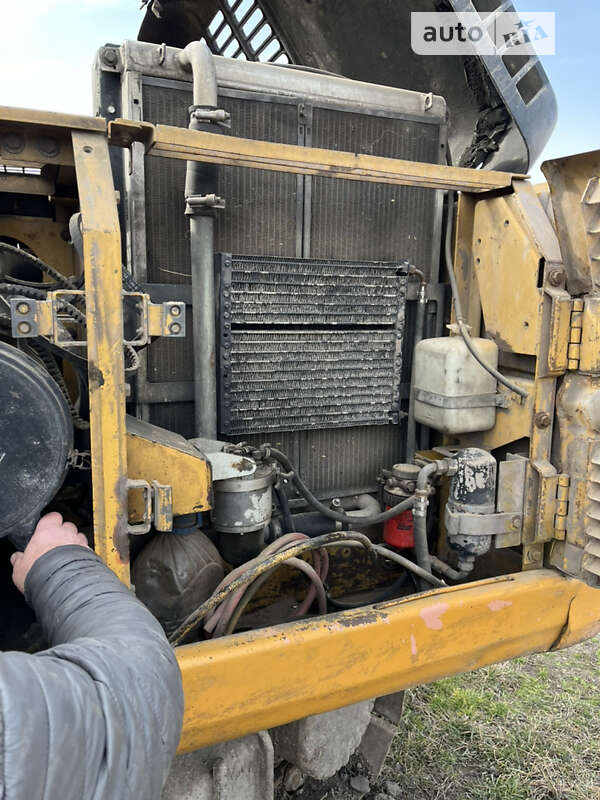 Экскаватор погрузчик Caterpillar 320 1998 в Запорожье