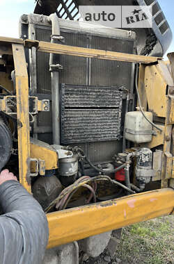 Экскаватор погрузчик Caterpillar 320 1998 в 