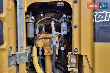 Гусеничный экскаватор Caterpillar 320 2014 в 