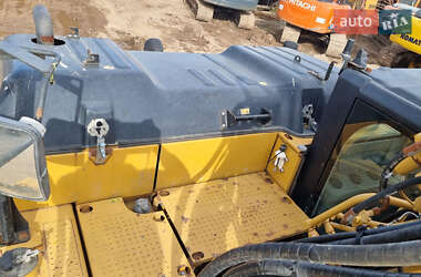 Гусеничный экскаватор Caterpillar 320 2013 в 