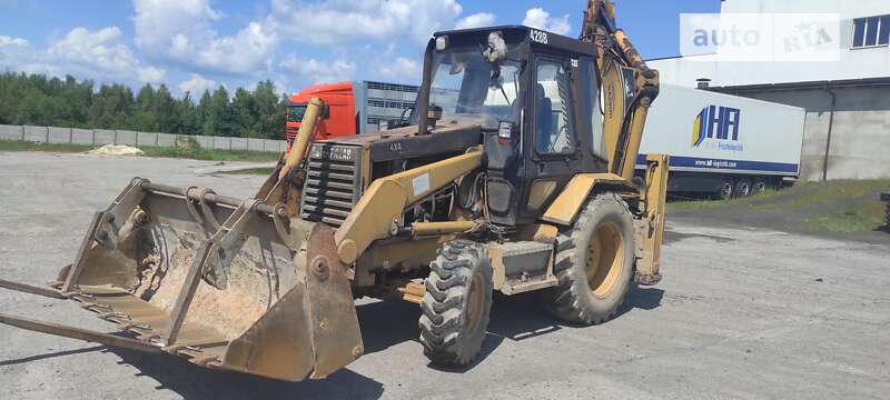 Экскаватор погрузчик Caterpillar 428 1996 в Новояворовске