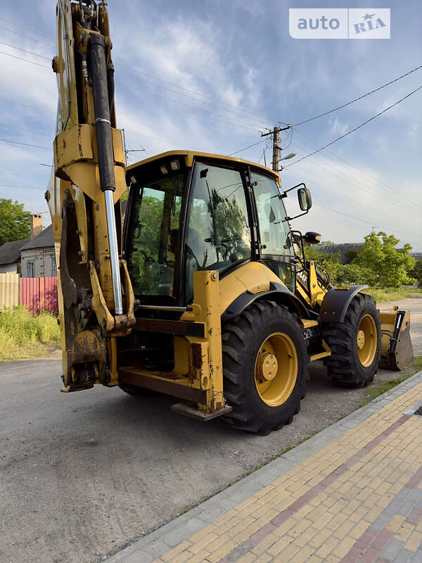 Экскаватор погрузчик Caterpillar 444 2014 в Павлограде