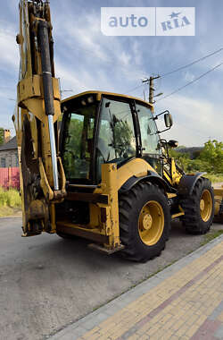 Экскаватор погрузчик Caterpillar 444 2014 в 