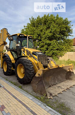 Экскаватор погрузчик Caterpillar 444 2014 в 