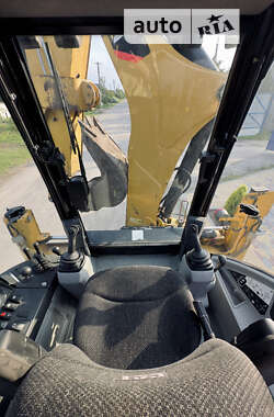 Экскаватор погрузчик Caterpillar 444 2014 в 