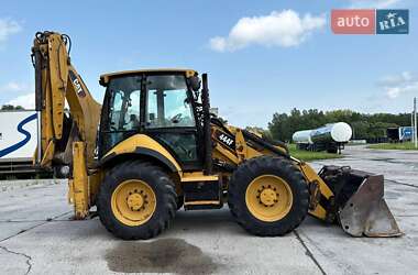 Экскаватор погрузчик Caterpillar 444 2014 в 