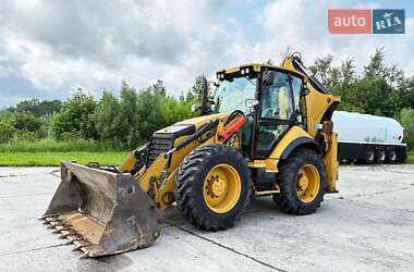 Экскаватор погрузчик Caterpillar 444 2014 в 