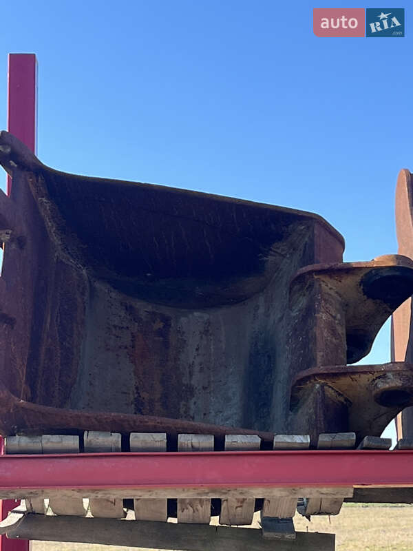 Колесный экскаватор Caterpillar M312 2001 в Косове