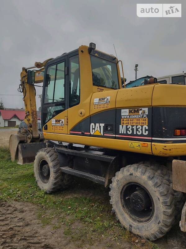 Колісний екскаватор Caterpillar M313 2006 в Рівному