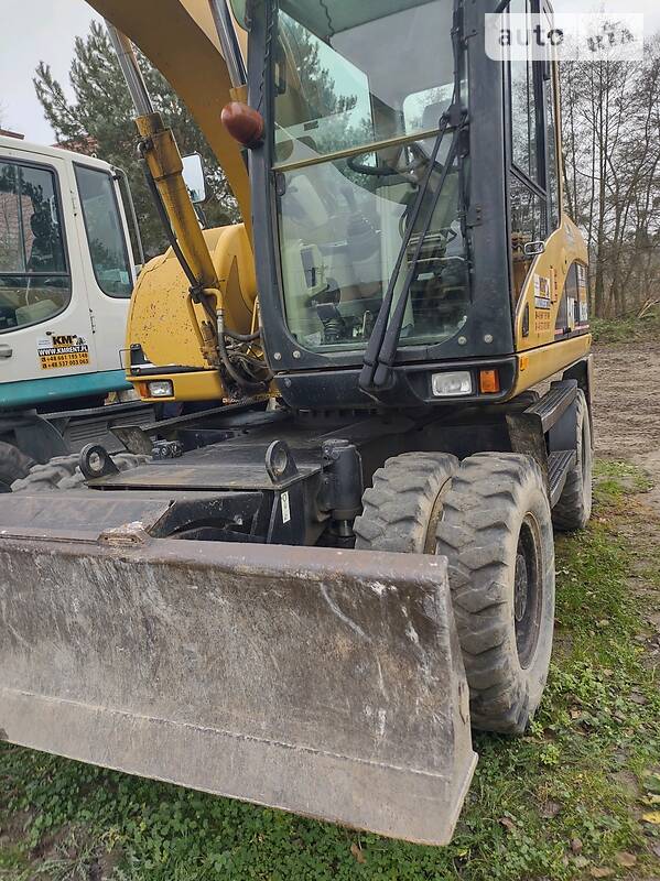 Колісний екскаватор Caterpillar M313 2006 в Рівному