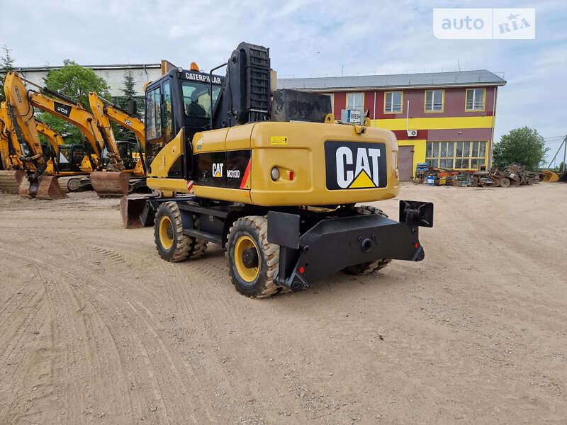 Колісний екскаватор Caterpillar M313 2011 в Одесі