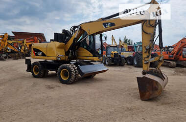 Колісний екскаватор Caterpillar M313 2011 в Одесі