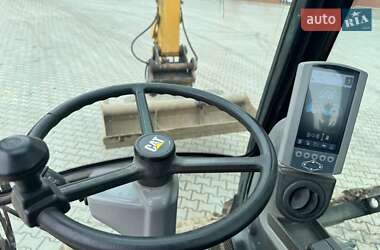 Колесный экскаватор Caterpillar M313 2012 в 