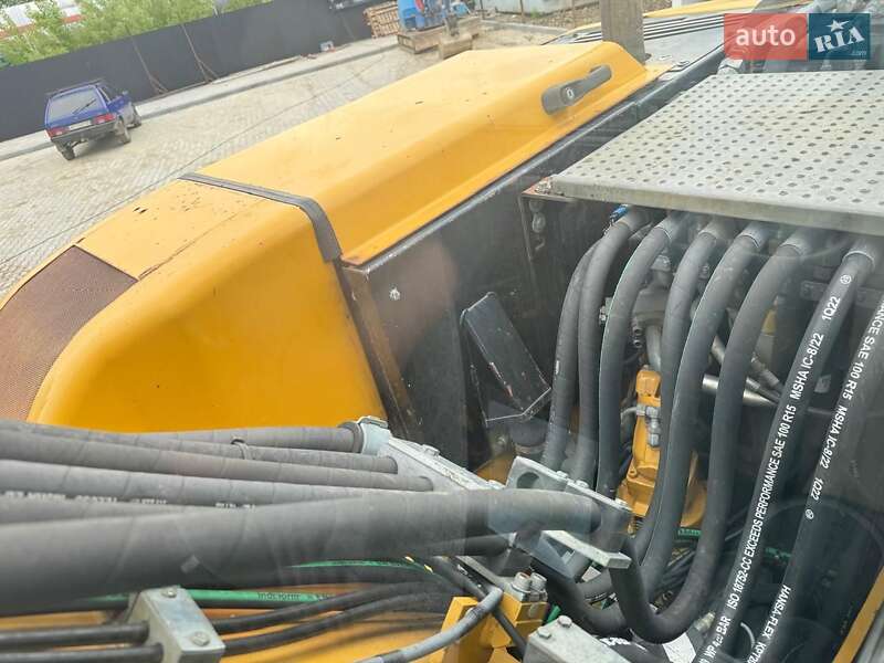 Колесный экскаватор Caterpillar M313 2012 в Долине