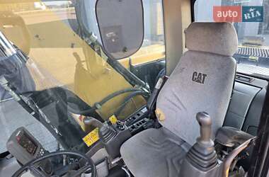 Колесный экскаватор Caterpillar M315 2009 в 