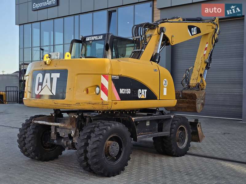 Колесный экскаватор Caterpillar M315 2009 в Ровно