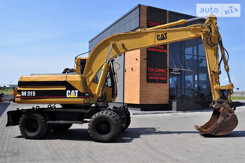 Колісний екскаватор Caterpillar M316 2002 в Рівному