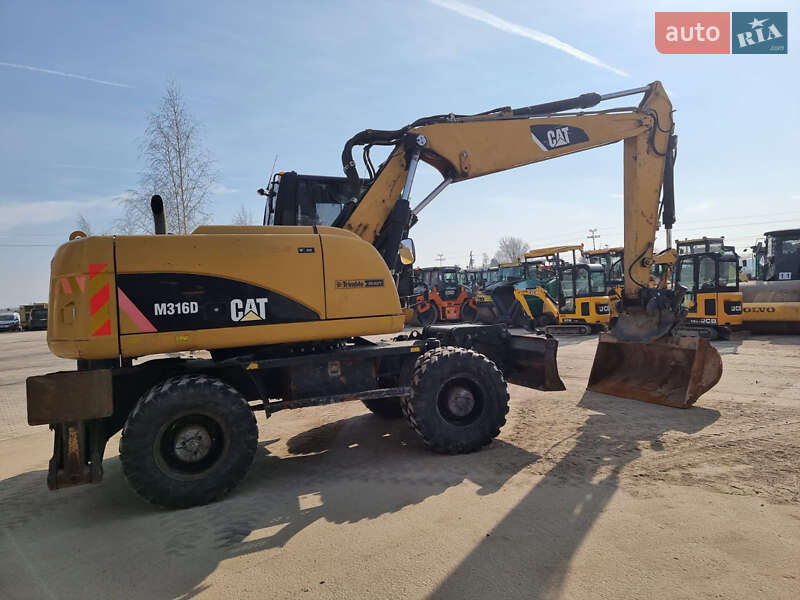 Колесный экскаватор Caterpillar M316 2012 в Одессе