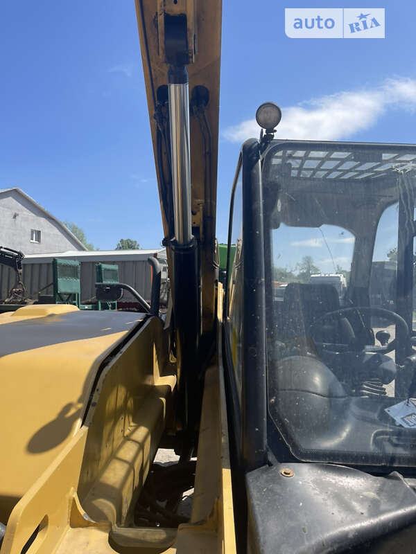 Телескопический погрузчик Caterpillar TH 414 2012 в Киеве